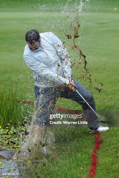 Duncan Stewart of Scotland plays out of the water on the third hole during the third round of the Tshwane Open at Pretoria Country Club on March 4,...