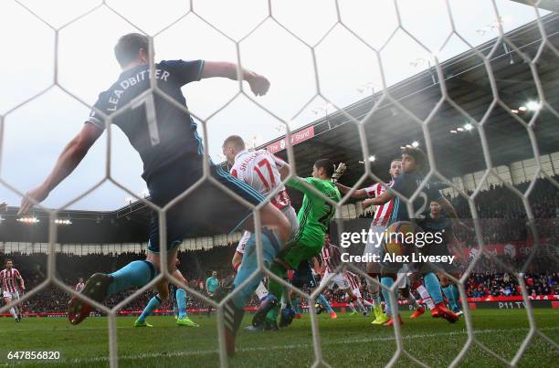 Marko Arnautovic of Stoke City scores his sides second goal past Victor Valdes of Middlesbrough during the Premier League match between Stoke City...