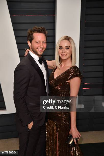 Writer Derek Blasberg and singer/songwriter Katy Perry attend the 2017 Vanity Fair Oscar Party hosted by Graydon Carter at Wallis Annenberg Center...