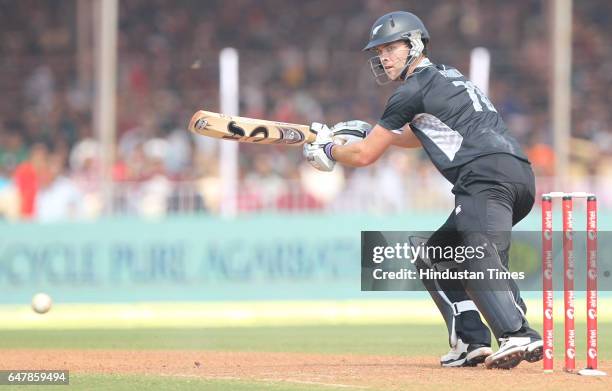 New Zealand batsman James Franklin plays a shot during the third One Day International at the Reliance stadium in Vadodara.