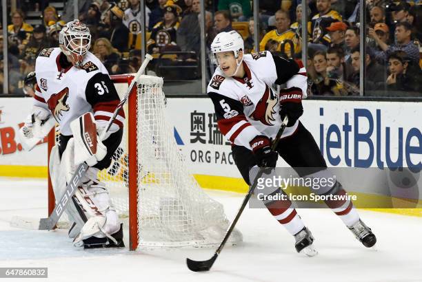 Arizona Coyotes defenseman Connor Murphy starts up ice during a regular season game between the Boston Bruins and the Arizona Coyotes on February 28,...