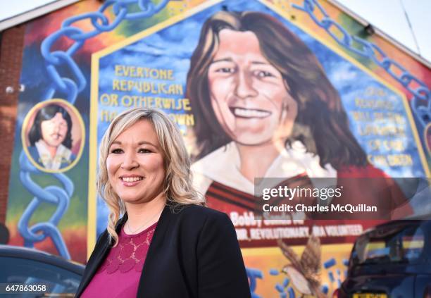 Sinn Fein northern leader Michelle O'Neill stands in front a mural of republican hunger striker Bobby Sands after holding a post election press...