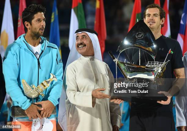 Winner Andy Murray of Great Britain, runner up Fernando Verdasco of Spain and Sheikh Hasher Bin Maktoum Al Maktoum, President of Tennis Emirates pose...