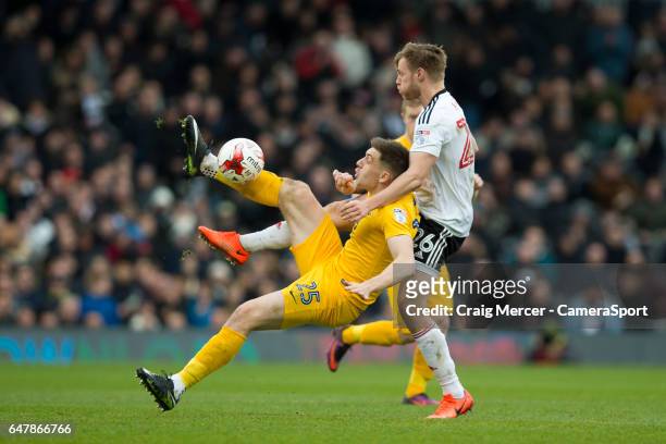 Preston North End's Jordan Hugill battles for possession with Fulham's Tomas Kalas during the Sky Bet Championship match between Fulham and Preston...