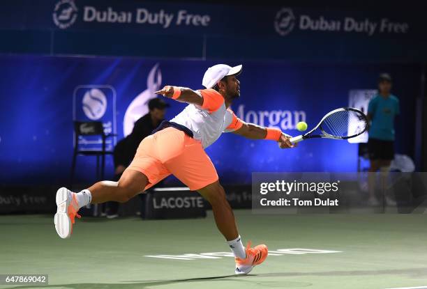 Fernando Verdasco of Spain plays a forehand during his final match against Andy Murray of Great Britain on day seven of the ATP Dubai Duty Free...