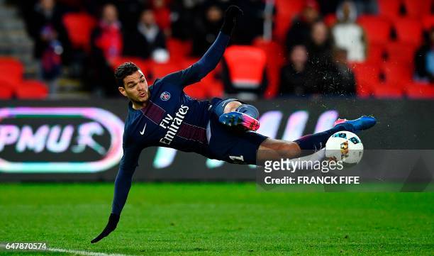 Paris Saint-Germain's French forward Hatem Ben Arfa kicks the ball during the French L1 football match between Paris Saint-Germain and Nancy at the...