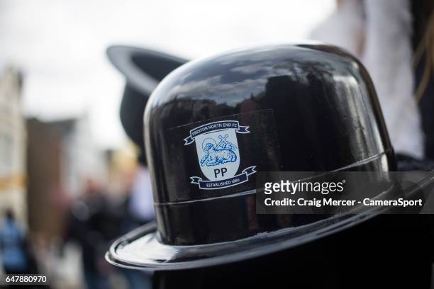 Bowler hat is seen being handed out to fans for Gentry Day before kick off during the Sky Bet Championship match between Fulham and Preston North End...
