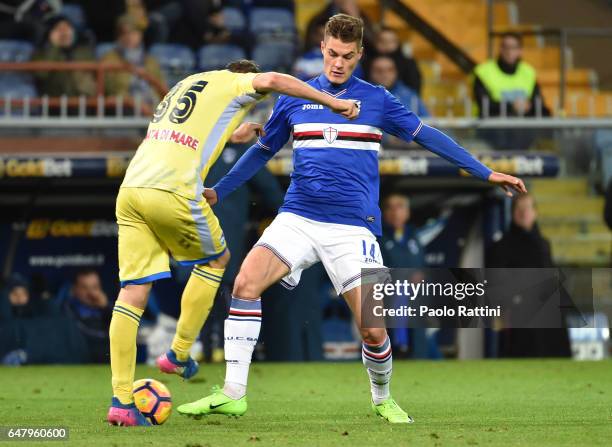 Patrik Schick of Sampdoria and Andrea Coda of Pescara during the Serie A match between UC Sampdoria and Pescara Calcio at Stadio Luigi Ferraris on...