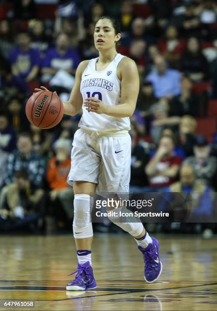 Washington Huskies Kelsey Plum brings up the ball during the women's Pac 12 college tournament game between the Washington Huskies and the Oregon...