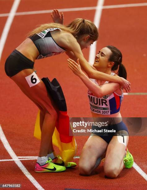 Gold medalist Laura Muir of Great Britain is congratulated by silver medalist Konstanze Klosterhalfen of Germany following the Women's 1500 metres...