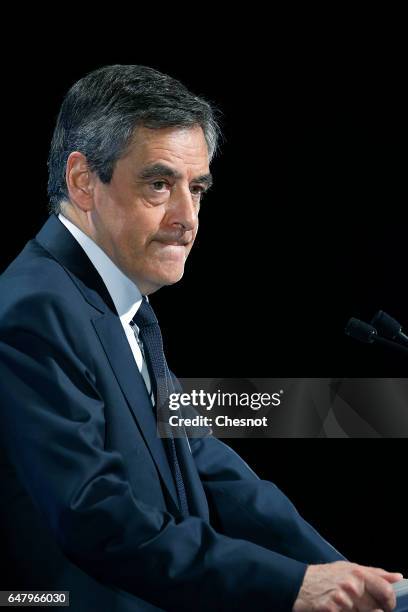 French presidential election candidate for the right-wing "Les Republicains" party Francois Fillon delivers a speech to present his program during a...