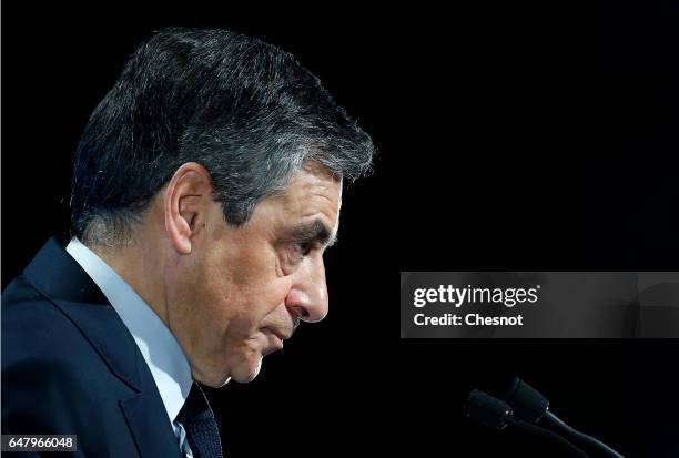 French presidential election candidate for the right-wing "Les Republicains" party Francois Fillon delivers a speech to present his program during a...