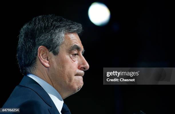 French presidential election candidate for the right-wing "Les Republicains" party Francois Fillon delivers a speech to present his program during a...