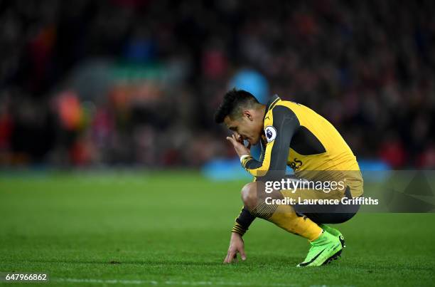 Alexis Sanchez of Arsenal looks dejected during the Premier League match between Liverpool and Arsenal at Anfield on March 4, 2017 in Liverpool,...