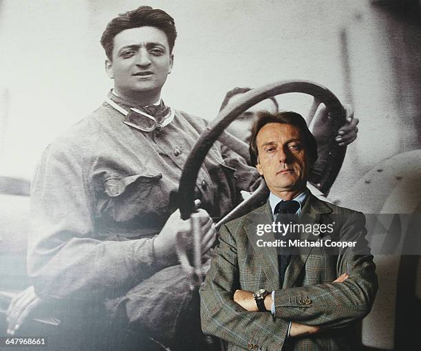 And Chairman of Ferrari, Luca Di Montezemolo stands in front of a picture of Scuderia Ferrari founder Enzo Ferrari on 28th April 1999 at the Scuderia...