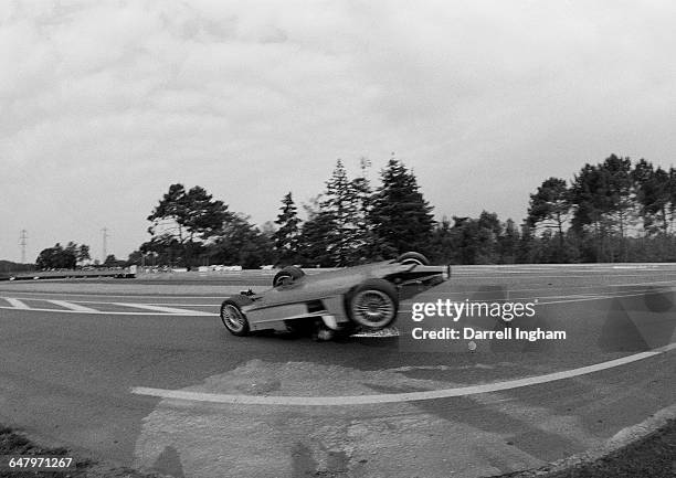 Mark Webber of Australia driving the AMG-Mercedes Mercedes-Benz CLR V8 becomes airborne over the hump of the Mulsanne Straight crashes onto his roof...