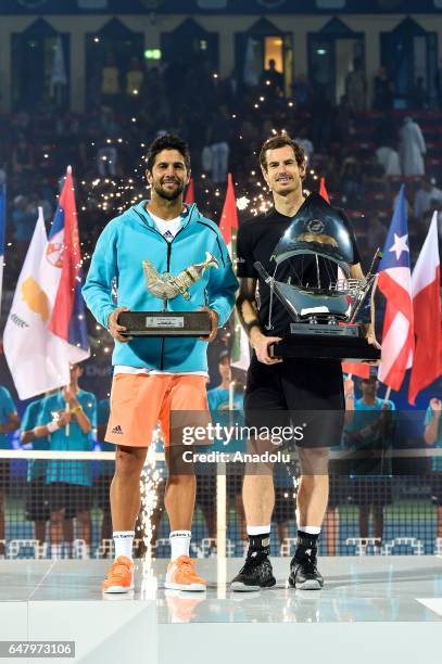 Winner Andy Murray of Great Britain and runner up Fernando Verdasco of Spain pose with the trophies after their final match on day seven of the ATP...
