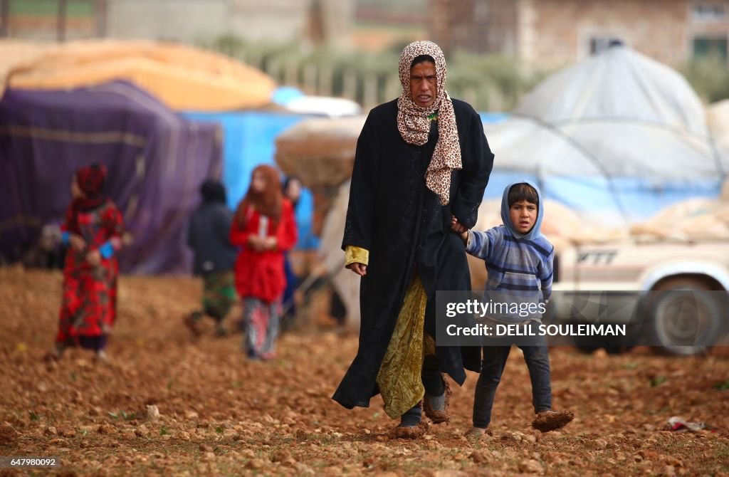 TOPSHOT-SYRIA-CONFLICT-REFUGEES