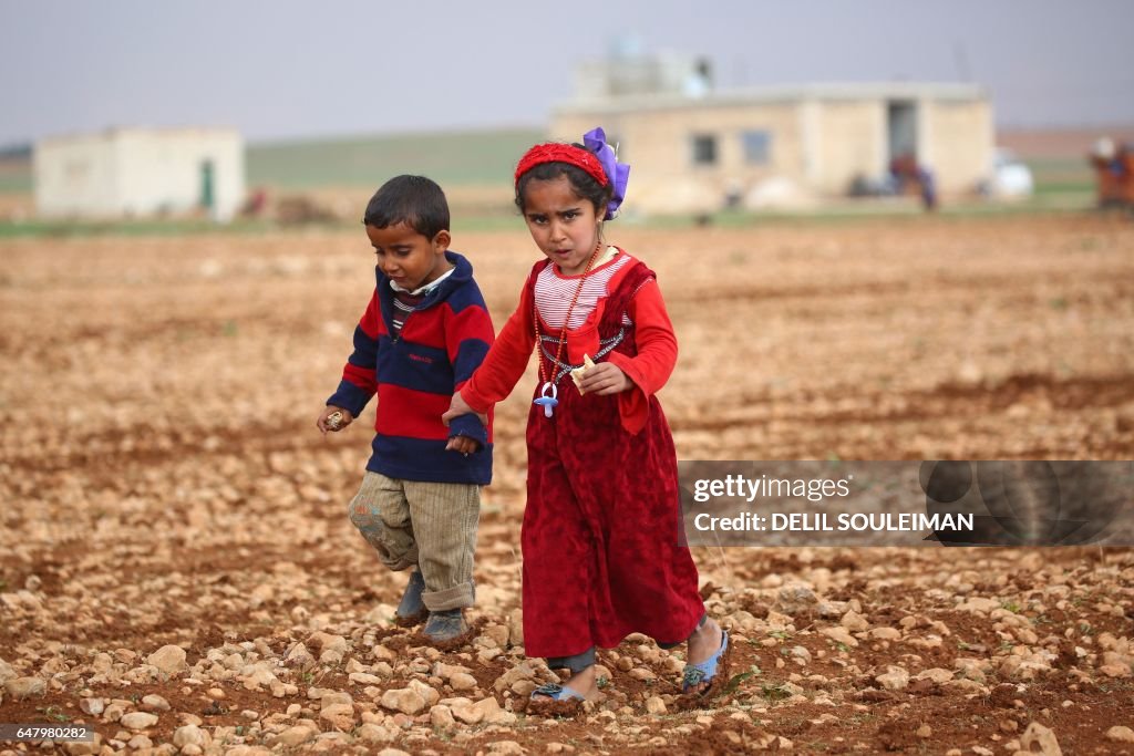 TOPSHOT-SYRIA-CONFLICT-REFUGEES