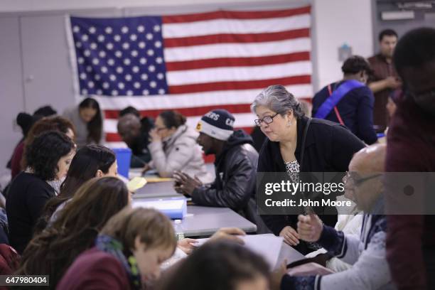 Immigrants receive assistance to complete their U.S. Citizenship applications during a Citizenship Now! event held in the Bronx on March 4, 2017 in...