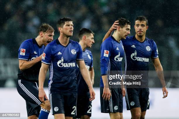 Franco Matias Di Santo , Leon Goretzka and Klaas-Jan Huntelaar of Schalke react after the Bundesliga match between Borussia Moenchengladbach and FC...