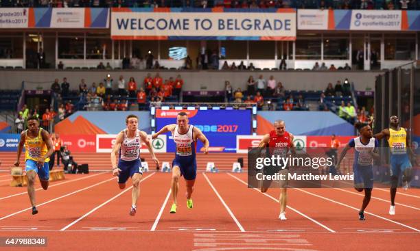 Richard Kilty of Great Britain crosses the finish line ahead of Jan Volko of Slovakia to win the gold medal on day two of the 2017 European Athletics...