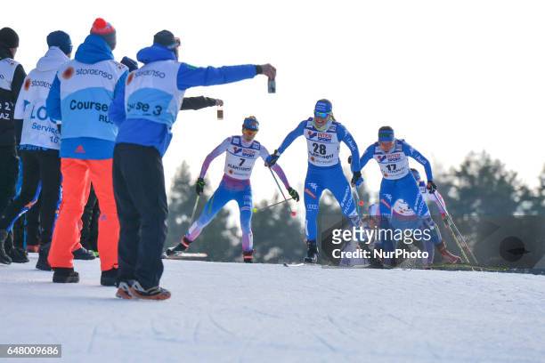 Laura Mononen from Finland, Elisa Brocard and Ilaria Debertolis, both from Italy during Ladies cross-country 30 km Mass Start Free final, at FIS...