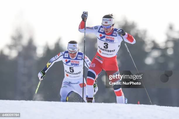 Marit Bjoergen from Norway, ahead of Charlotte Calla from Sweden from Norway, leads during Ladies cross-country 30 km Mass Start Free final, at FIS...