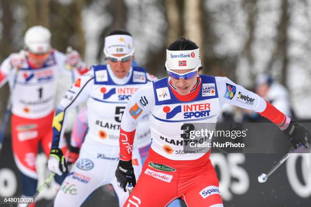 Marit Bjoergen from Norway, ahead of Charlotte Calla from Sweden and Heidi Weng from Norway, leads during Ladies cross-country 30 km Mass Start Free...