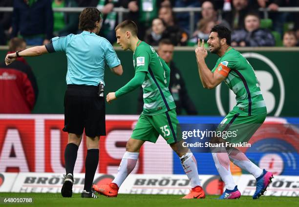 Claudio Pizarro of Bremen reacts to referee Guido Winkmann during the Bundesliga match between Werder Bremen and SV Darmstadt 98 at Weserstadion on...