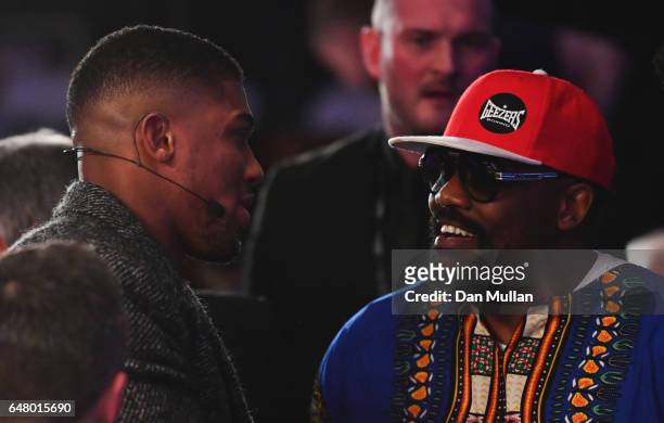 Boxers Anthony Joshua and Dereck Chisora in discussion at ringside at The O2 Arena on March 4, 2017 in London, England.
