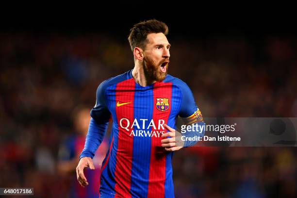 Lionel Messi of Barcelona celebrates after scoring the opening goal during the La Liga match between FC Barcelona and RC Celta de Vigo at the Camp...