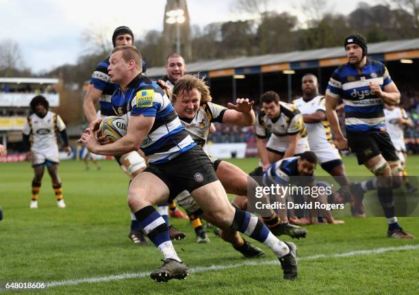 Chris Cook of Bath breaks clear of Tommy Taylor during the Aviva Premiership match between Bath and Wasps at the Recreation Ground on March 4, 2017...