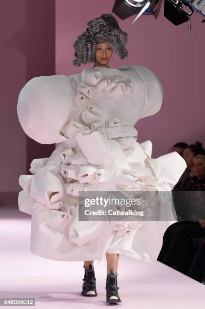 Model walks the runway at the Commes Des Garcons Autumn Winter 2017 fashion show during Paris Fashion Week on March 4, 2017 in Paris, France.