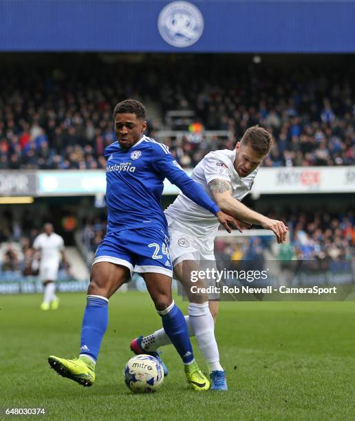 Cardiff City's Kadeem Harris and Queens Park Rangers' Jamie Mackie during the Sky Bet Championship match between Queens Park Rangers and Cardiff City...