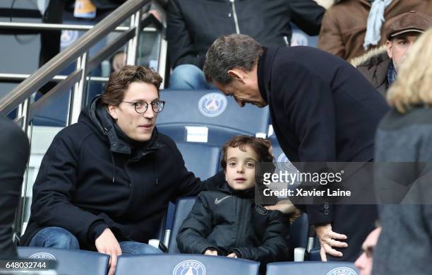 French Politician Nicolas Sarkozy and his son Jean Sarkozy and grandson Solal Sarkozy attend the French Ligue 1 match between Paris Saint-Germain and...