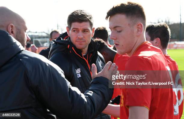 Liverpool Academy Coach Steven Gerrard with Rob Jones and George Johnston before the Liverpool v Manchester City U18 Premier League game at The...
