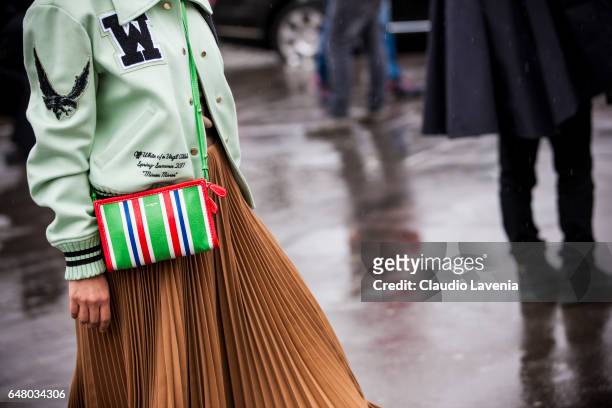 Jeannie Lee, Off-White jacket details, is seen in the streets of Paris before the Haider Ackermann show during Paris Fashion Week Womenswear...