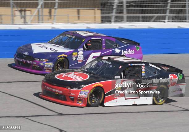 Austin Dillon Richard Childress Racing Rheem Chevrolet Camaro and Darrell Wallace Jr Roush/Fenway Racing Leidos Ford Mustang racing side by side...