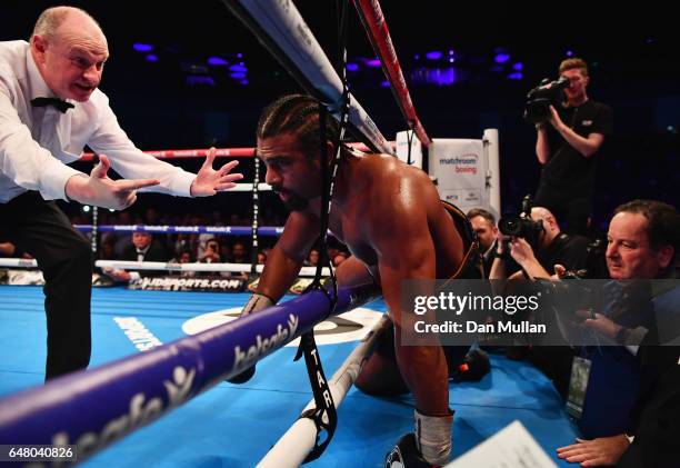 David Haye falls through the ropes during his Heavyweight contest against Tony Bellew at The O2 Arena on March 4, 2017 in London, England.