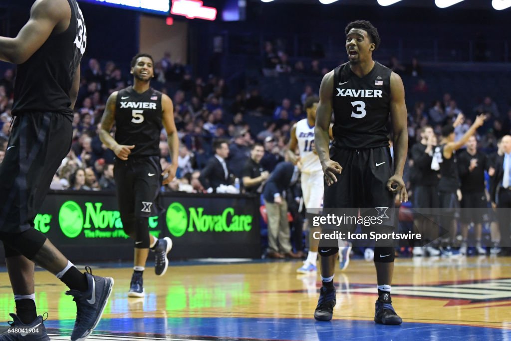 Xavier Musketeers guard Quentin Goodin and Xavier Musketeers guard ...