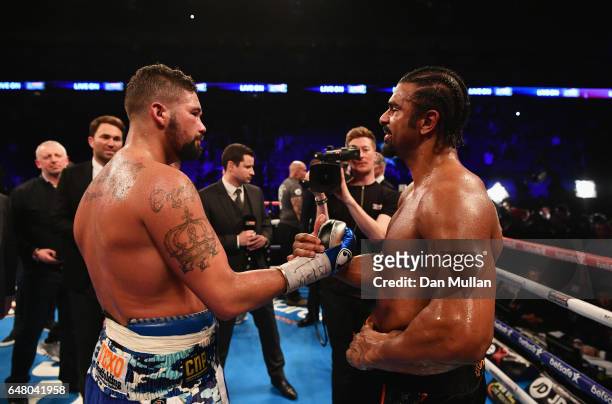 Tony Bellew shakes hands with David Haye after his 11th round TKO victory after their Heavyweight contest at The O2 Arena on March 4, 2017 in London,...