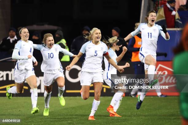 England's Ellen White leaps into the air after scoring the go-ahead goal against the United States as the United States and England women's national...