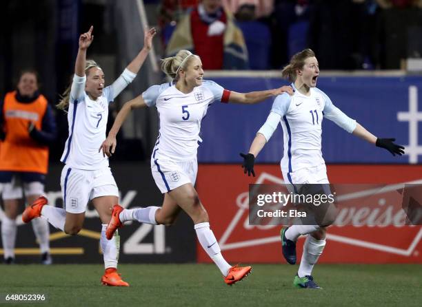 Ellen White of England celebrates her goal with teammates Jordan Nobbs and Steph Houghton in the second half against the United States during the...