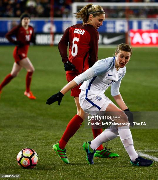 Ellen White of England fights for the ball with Morgan Brian of USA during the 2017 SheBelieves Cup at Red Bull Arena on March 4, 2017 in Harrison,...