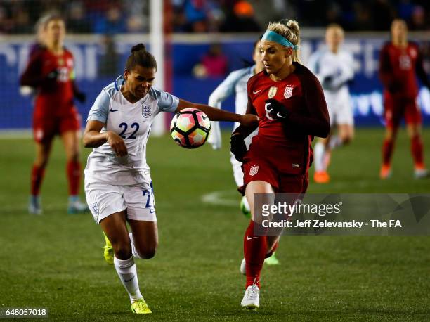 Nikita Parris of England fights for the ball with Julie Johnston of USA during the 2017 SheBelieves Cup at Red Bull Arena on March 4, 2017 in...