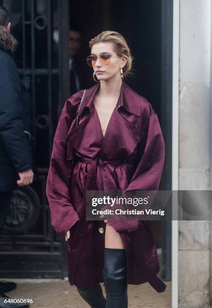 Model Hailey Baldwin wearing a velvet coat outside Elie Saab on March 4, 2017 in Paris, France.