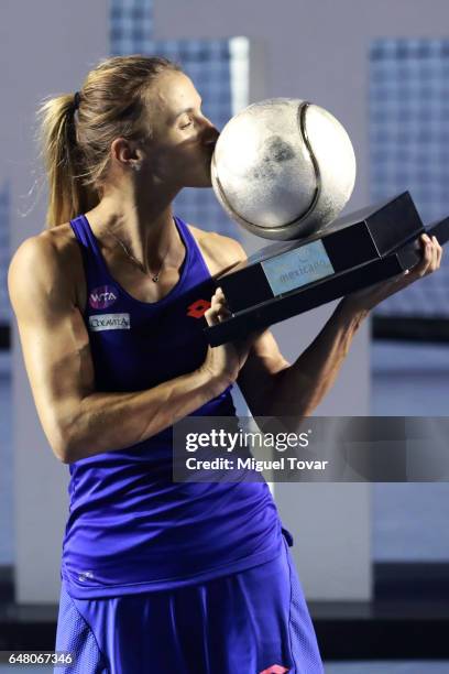 March 04: Lesia Tsurenko celebrates by kissing the champions trophy after winning the Final match between Lesia Tsurenko and Kristina Mladenovic as...