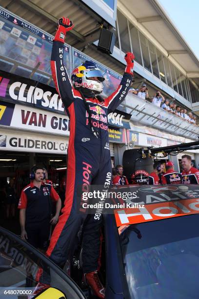 Shane Van Gisbergen driver of the Red Bull Holden Racing Team Holden Commodore VF celebrates after taking pole position for race 2 of the Clipsal...