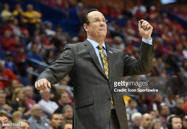 Wichita St. Head coach Gregg Marshall watches his team play during a semi-final round Missouri Valley Conference Men's Basketball Tournament game...